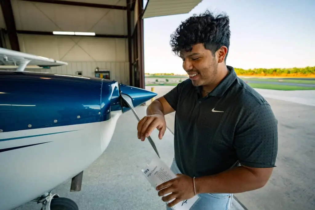 Flight instructor and student in the cockpit during training